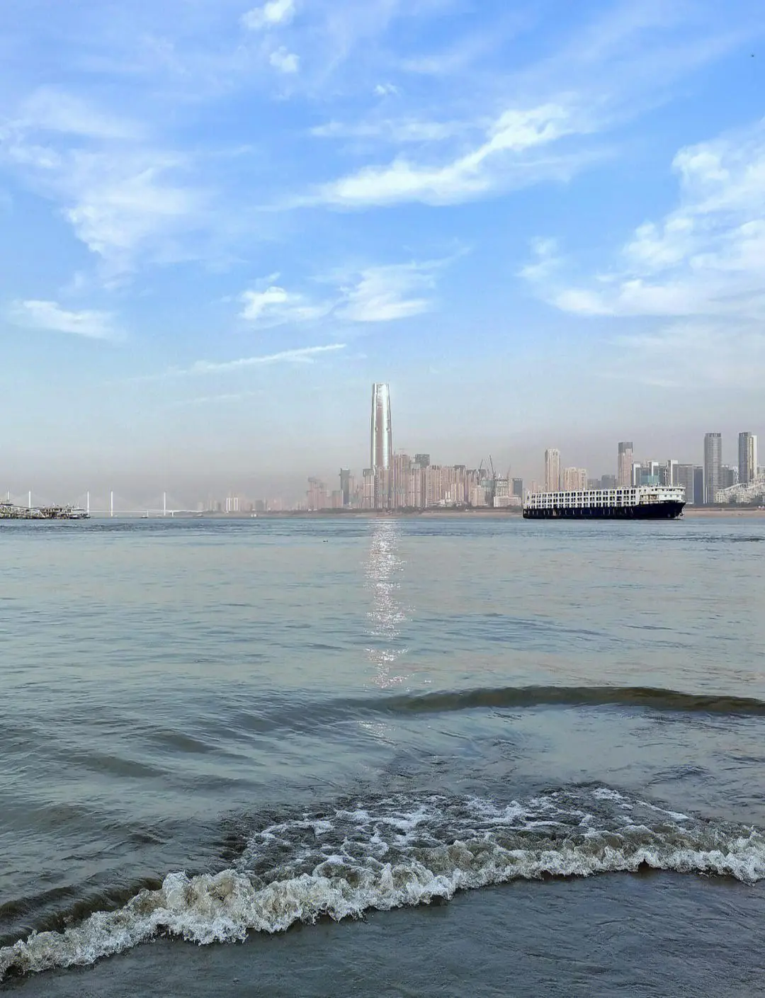 People cooling off by the Yangtze River in Wuhan during summer — the city is one of China's 'Three Furnaces'
