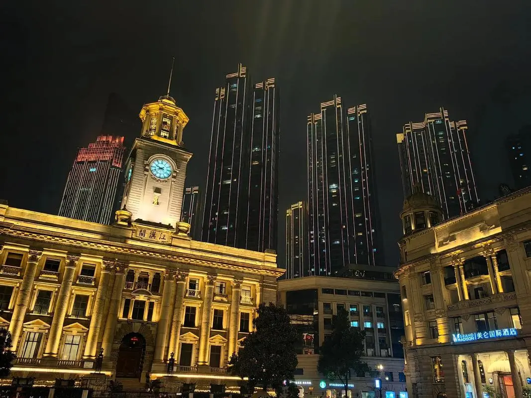 Hankou commercial district skyline in Wuhan — modern buildings and busy streets showing the city's commercial heart