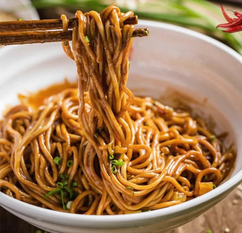 Close-up of Wuhan street food, hot dry noodles or similar local specialty, representing the down-to-earth, unpretentious culture that shapes how people speak to each other