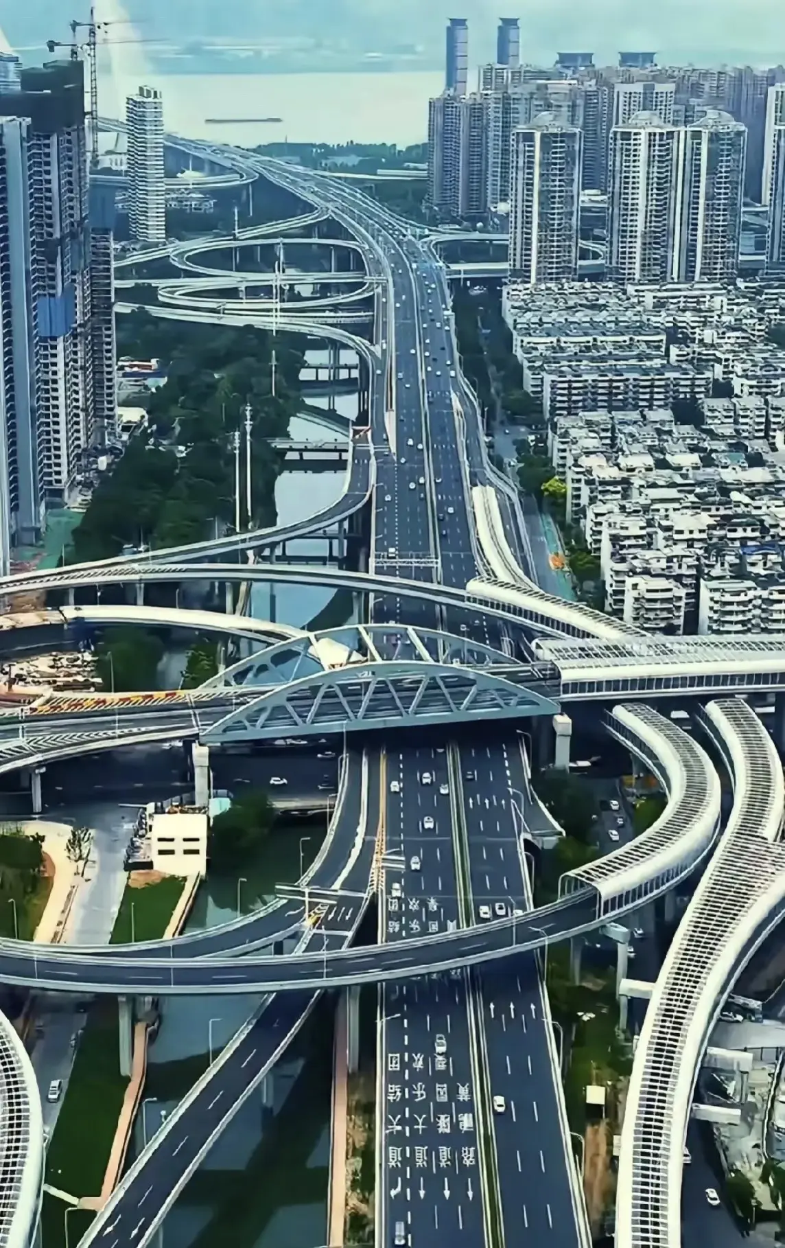 Wangjiadun Interchange in Wuhan, a five-level elevated highway interchange with curved concrete ramps spiraling around each other