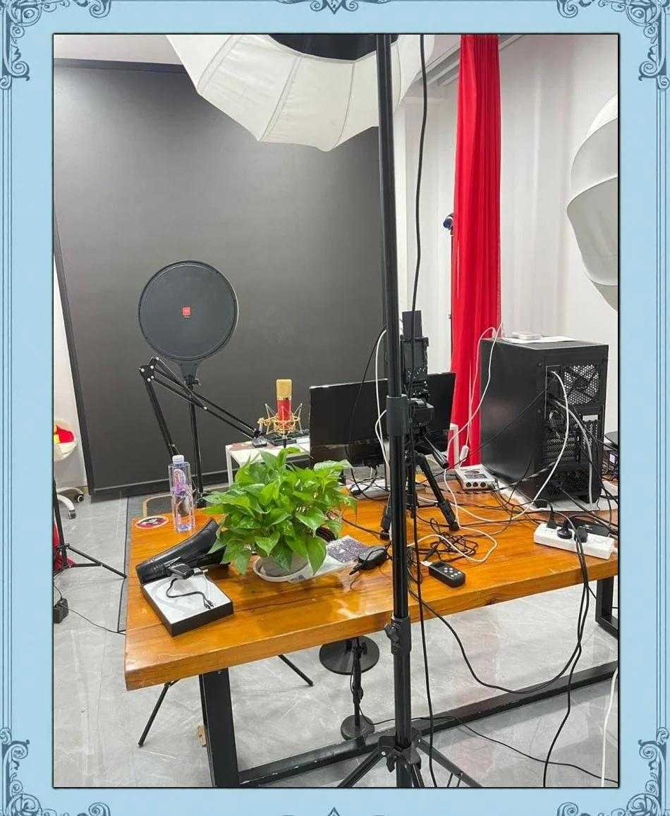 Inside a livestream studio: ring light, phone on tripod, product table behind a presenter during a live session