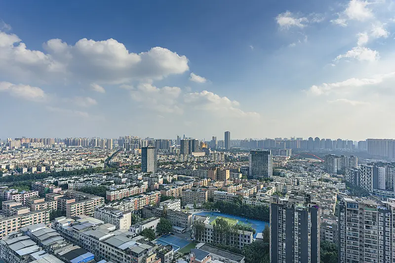 Wuchang university district in Wuhan, dense campus buildings and small shops along the street where the punk scene was born