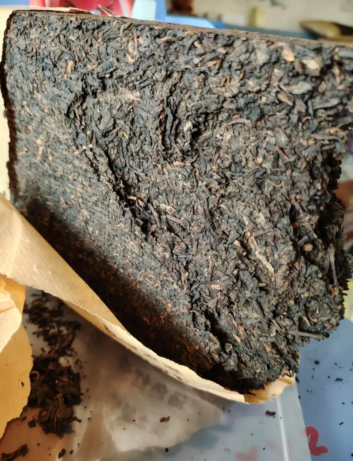 Compressed brick tea blocks showing the dense rectangular form of zhuan cha, the tea format Russian merchants shipped from Hankou to Moscow