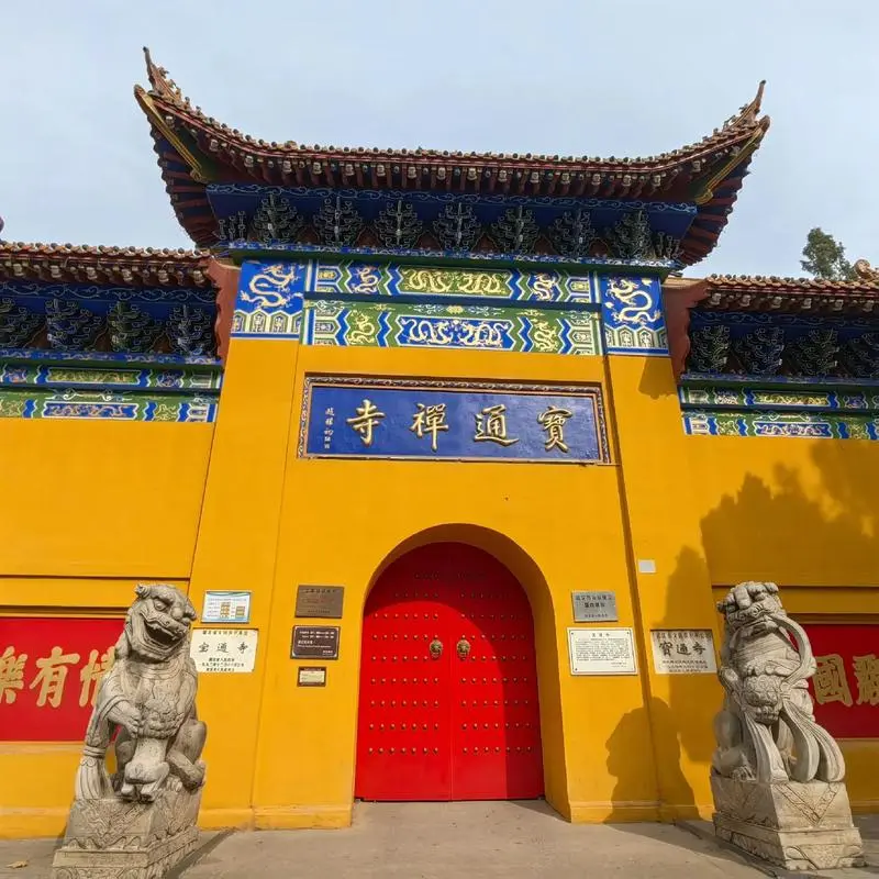 Golden arhat statues inside Guiyuan Temple Arhat Hall in Wuhan, each with a different facial expression
