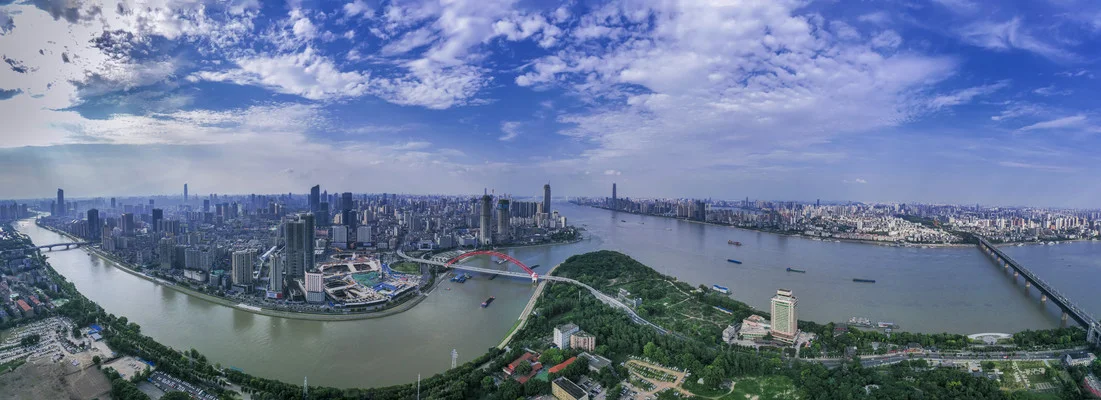 Panoramic view of Wuhan showing the confluence of Yangtze and Han rivers dividing the city into its three historic towns, captured from a high vantage point