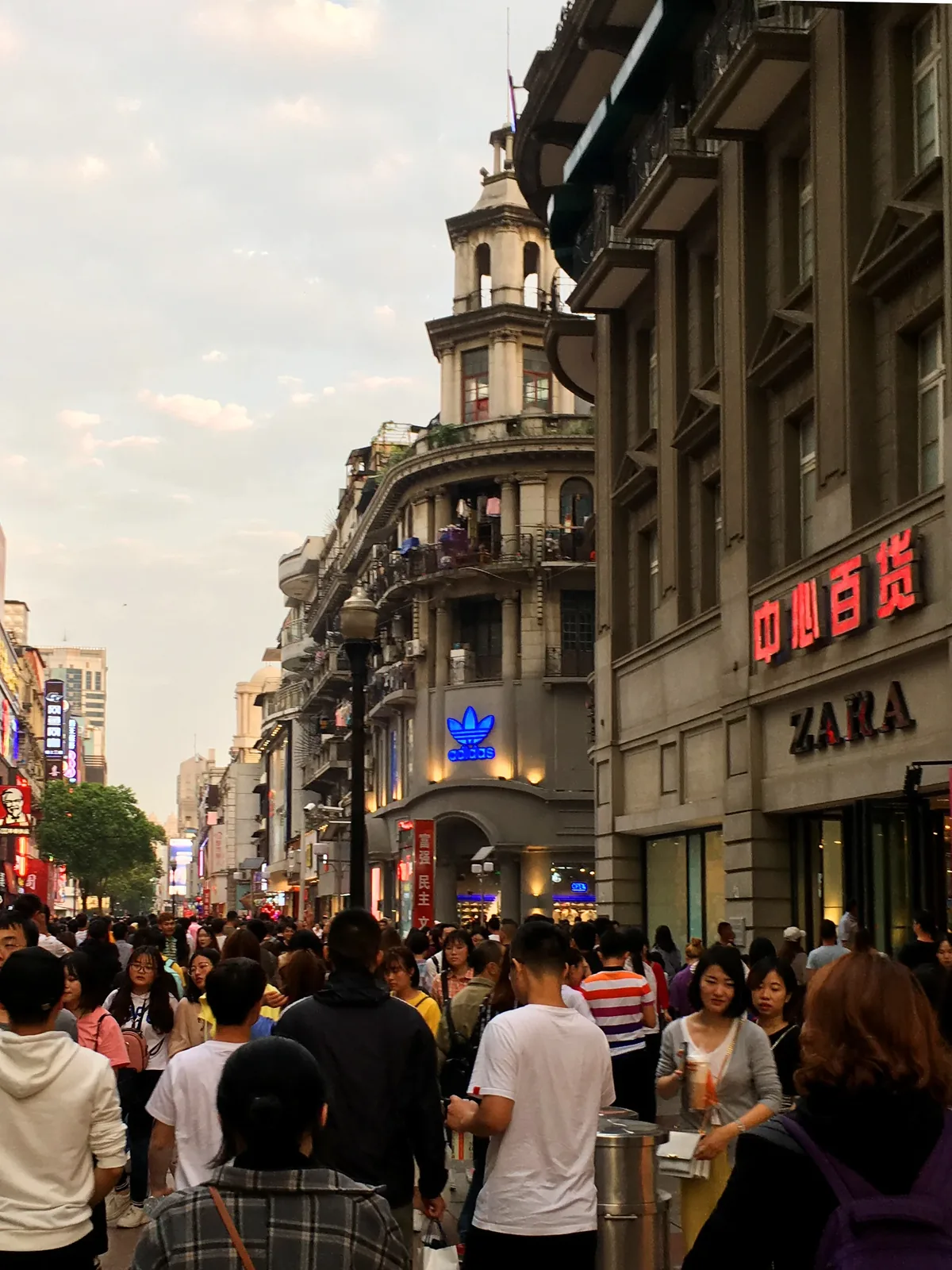 Hankou riverside showing foreign concession-era architecture and modern commercial buildings along the waterfront, representing the historical trading port heritage