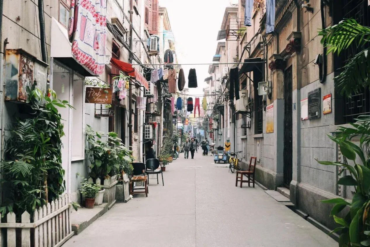 Hanyang riverside or traditional neighborhood showing local life, modest streets, and the grounded industrial-town atmosphere that defines Hanyang's character