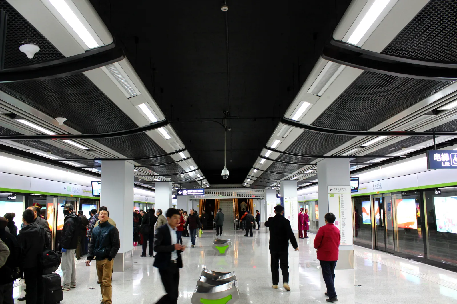 Wuhan metro platform with a train arriving — modern urban transit system in Wuhan, China